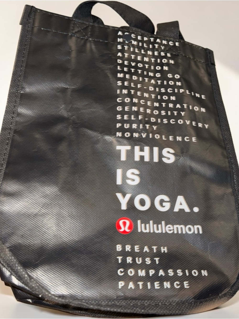 lululemon athletica Black Tote Bag with White Text and Red Logo
